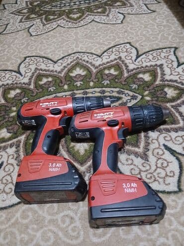slavina i protočni bojler 2 u 1: Dve Hilti bušilice/šrafilice, model SF 181-A. Obe su akumulatorske sa — 2