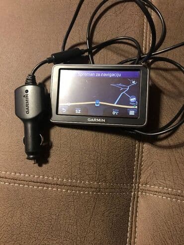GPS: Garmin 140 Navigacija ima svoj punjac ali je bez drzaca za sajbnu — 4