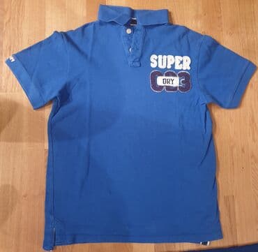 majica s: SuperDry, super dry plava polo majica sa kragnicom. Piše XL velicina — 1