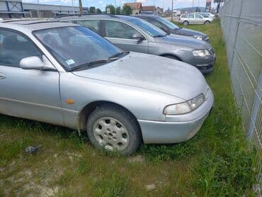 jelkice za auto na veliko: Mazda 626: 0.2 - engine capacity l | 1997 г. Sedan — 3
