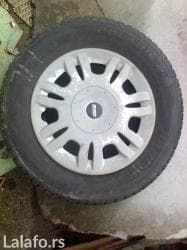 auto pojasevi u boji: Prodajem zimsku gumu barum-polaris 2-dimen. 185/70 r 14 u jako dobrom — 1