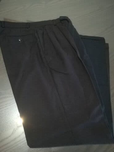 Muška odeća: Pantalone crne "Nicola*s" vel 104/46. Obim struka 72 cm, obim bokova — 4