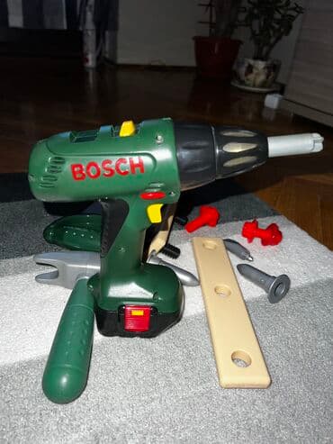 gumeni konjic za decu: BOSCH bušilica i alat sa slike.Bušilica ispravna,ide bez baterija — 1