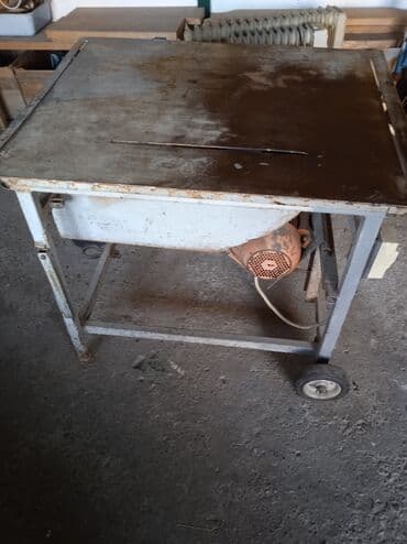 Kuća i bašta: Stona kružna testera sa metalnim postoljem i radnom površinom. Pogodna — 1