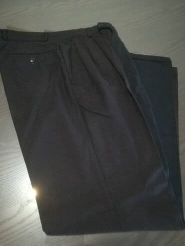 Muška odeća: Pantalone crne "Nicola*s" vel 104/46. Obim struka 72 cm, obim bokova — 8