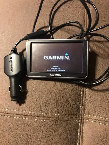 GPS: Garmin 140 Navigacija ima svoj punjac ali je bez drzaca za sajbnu — 3