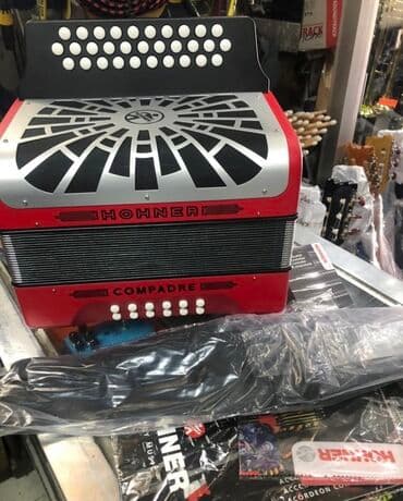 Muzički instrumenti: Hohner Compadre harmonika, dostupna u raznim bojama, uključujući — 4