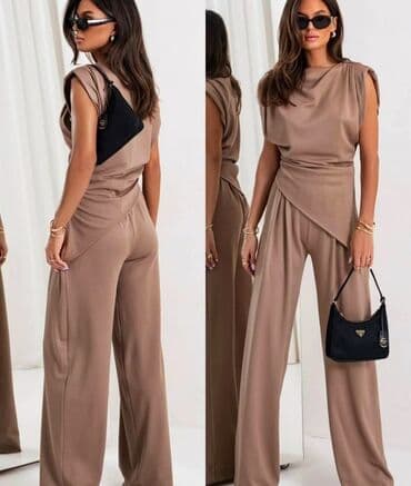 prsluk i pantalone komplet: Komplet 
Cena 2500 din — 1