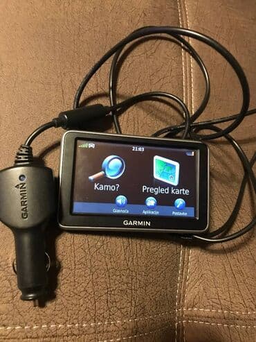 GPS: Garmin 140 Navigacija ima svoj punjac ali je bez drzaca za sajbnu — 2