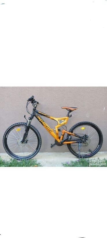 bicikl za mamu i bebu: Capriolo Iguana 260GS bicikl u narandžasto-crnoj boji. Ovaj model — 7