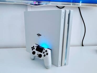 igrice za playstation 1: Sony Playstation 4 PRO  od 1Tb, puna instaliranih igrica. Bela sa — 9