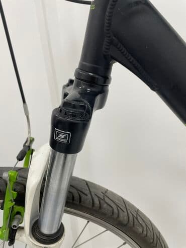Bicikli: Bulls Wildtail bicikl crne boje sa zelenim detaljima. Ima prednje — 10