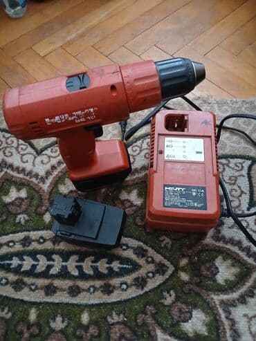 slavina i protočni bojler 2 u 1: Hilti bušilica/šrafilica model SB 10. Uz nju dolazi punjač i jedna — 2