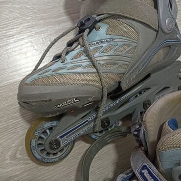 otkup ordenja i medalja: Roleri marke Rollerblade, kombinacija sive i svetloplave boje. Imaju — 2
