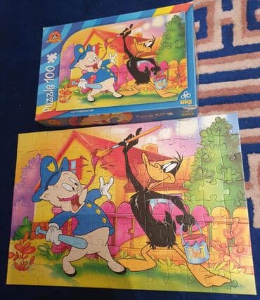 kos i gol za decu: ﻿Looney tunes Trefl puzzle- puzle. 100 komada.  Lovac i patak Daca — 2