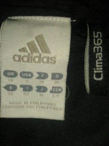 muški šalovi h m: Prodajem prsluk adidas sa slike, crne boje, nov, broj kao na slici — 2