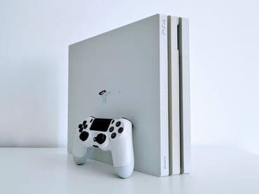 igrice za playstation 1: Sony Playstation 4 PRO  od 1Tb, puna instaliranih igrica. Bela sa — 3