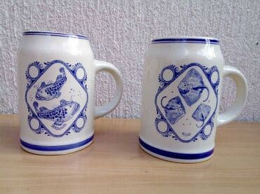 stari satovi prodaja: 2 DELFT krigle 2 Delft krigle rukom oslikane Visina 13 cm, prečnik — 1