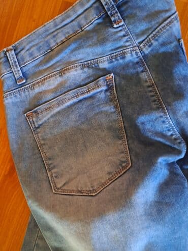 leopard pantalone: Taksas farmerice, tanji teksas. Zvoncare sa prorezima. Nove — 1