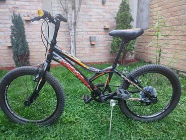bicikli sa prednjim i zadnjim amortizerima: Dečij bicikl - ram 11" - čelik - točkovi 20" preporučena visina vozača — 1