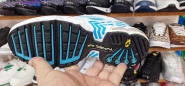 plave tn patike: The North Face — 1