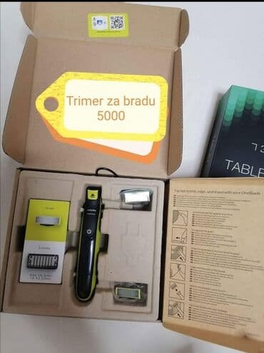 aplikator za sociva cena: Philips OneBlade trimer u crnoj boji sa žutim akcentima, dizajniran za — 3