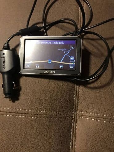 GPS: Garmin 140 Navigacija ima svoj punjac ali je bez drzaca za sajbnu — 1