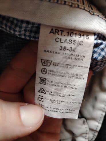 pantalone s: Exit crne pantalone 38 - 34.
Pamuk i lan — 5
