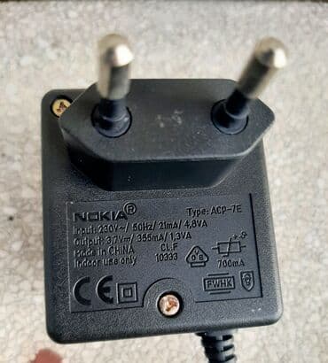 polovni telefoni pancevo: Punjač Nokia ACP-7E ispravan ulaz 230V, 50Hz/21mA/4,8VA, izlaz 3,7V — 1