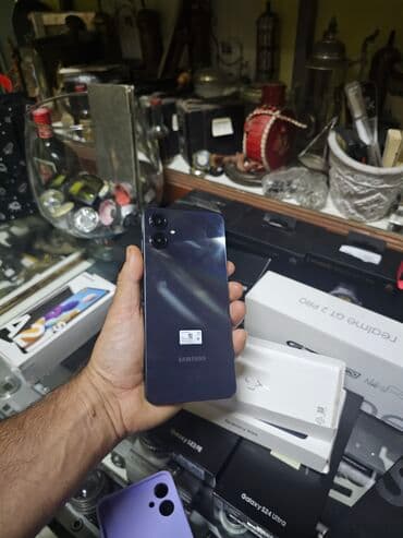ruter sa sim karticom cena: Samsung Galaxy A06, 128 GB, bоја - Maslinasto zelena, Garancija, Otisak prsta, Dual SIM — 4