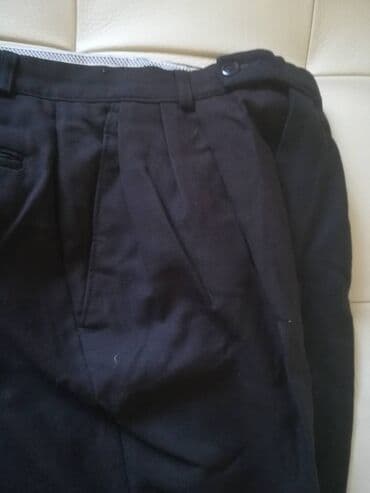 Muška odeća: Pantalone crne "Nicola*s" vel 104/46. Obim struka 72 cm, obim bokova — 5