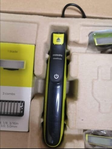 aplikator za sociva cena: Philips OneBlade trimer u crnoj boji sa žutim akcentima, dizajniran za — 1