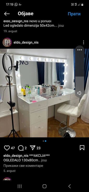 ugaone garniture u p: Toaletni sto u beloj boji sa velikim ogledalom okruženim sijalicama — 1