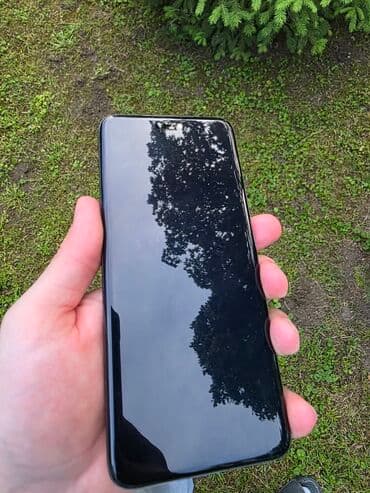 Honor: Honor Magic 5 Pro, bоја - Siva, Otisak prsta — 2