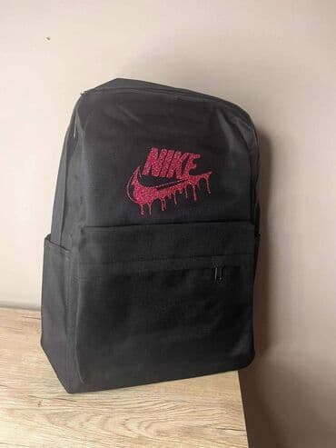 srednji kofer dimenzije: Nike — 3