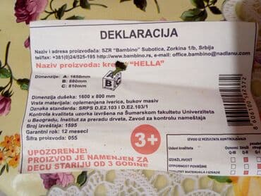 forma ideale komode za spavacu sobu: Dečiji krevet sa drvenim letvicama i dušekom. Krevet je izrađen od — 5