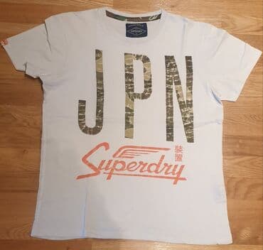 majica s: SuperDry - super dry bela muška majica. Piše xl velicina, ali moze i — 1