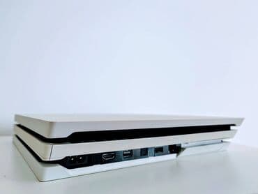 igrice za playstation 1: Sony Playstation 4 PRO  od 1Tb, puna instaliranih igrica. Bela sa — 4