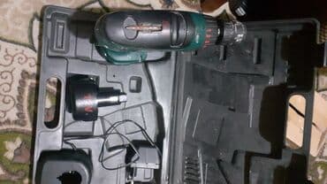 slavina i protočni bojler 2 u 1: Akumulatorska bušilica Black & Decker, dolazi u originalnom koferu — 1